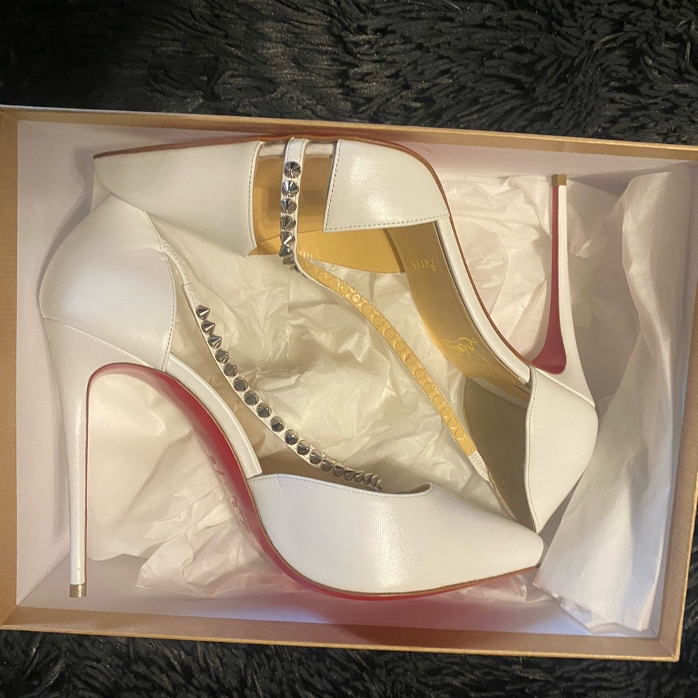Christian Louboutin’s white spike strap… brand new size 40.5
